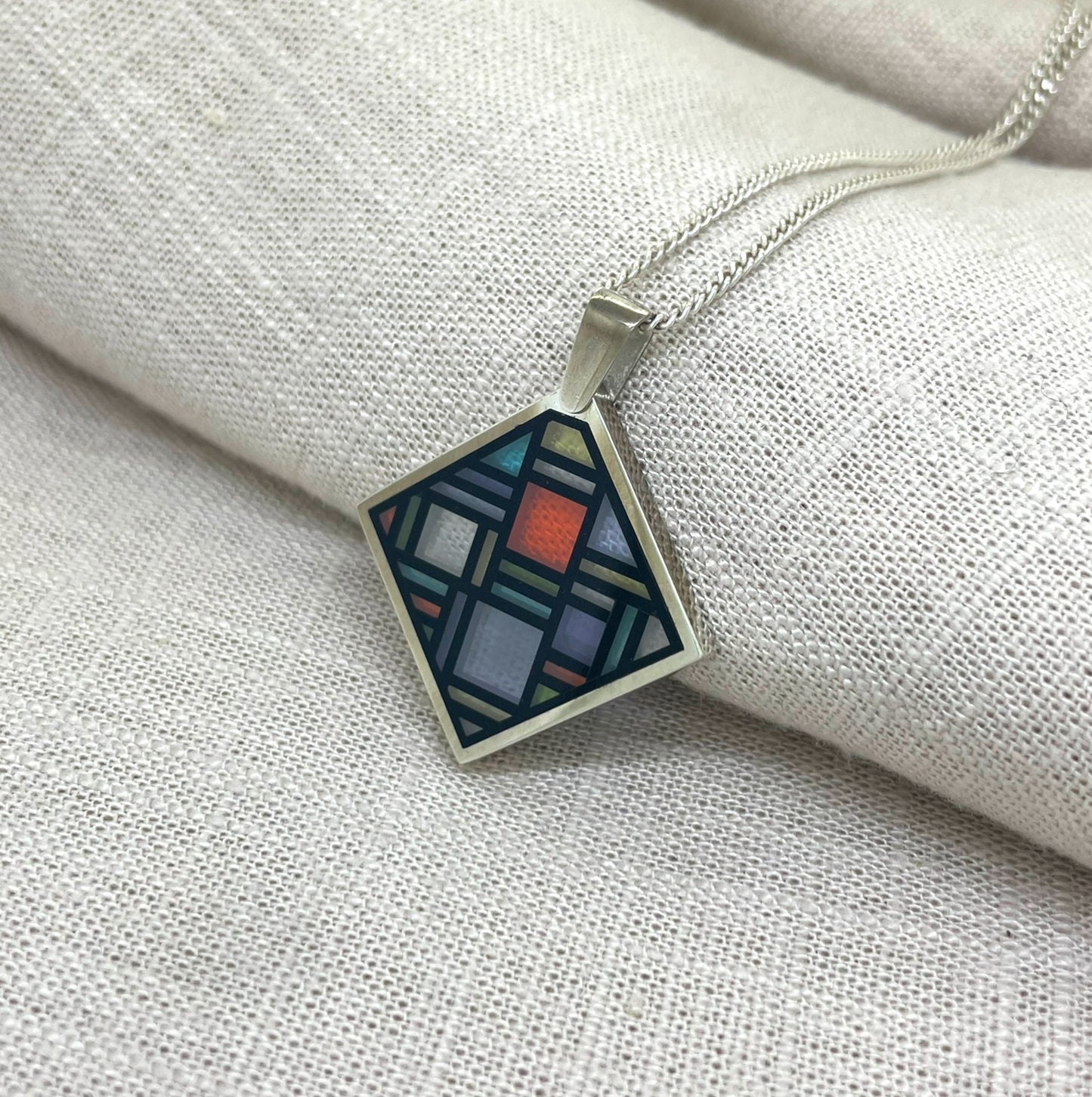 Mosaic Cubic Zirconia and Cowell Black Jade Square Pendant